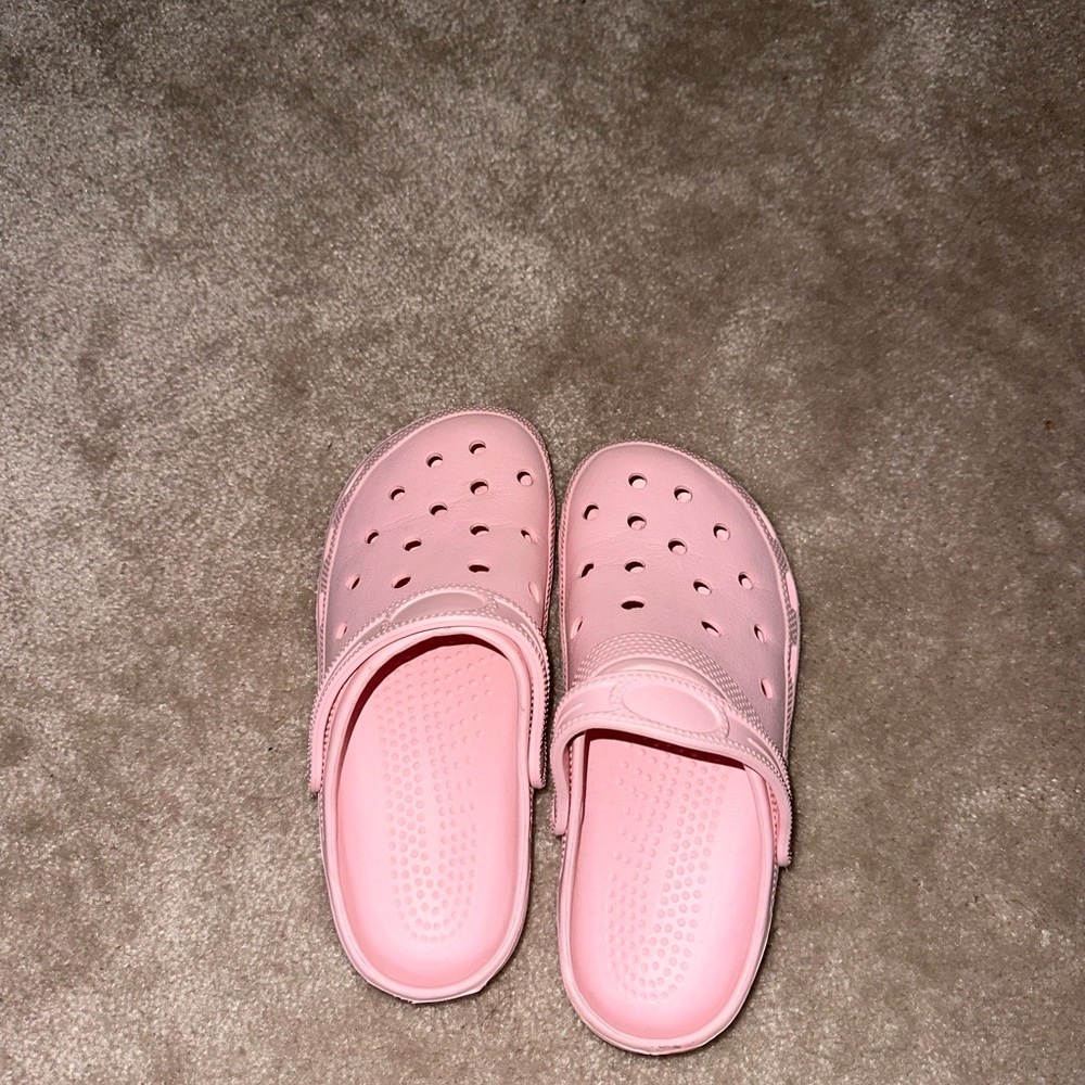 Pink rubber clogs